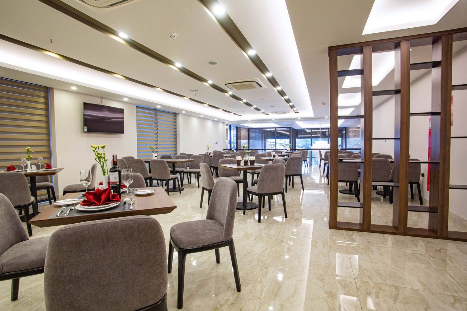 Spacious, modern restaurant dining area with stylish decor in Hà Nội, Vietnam.