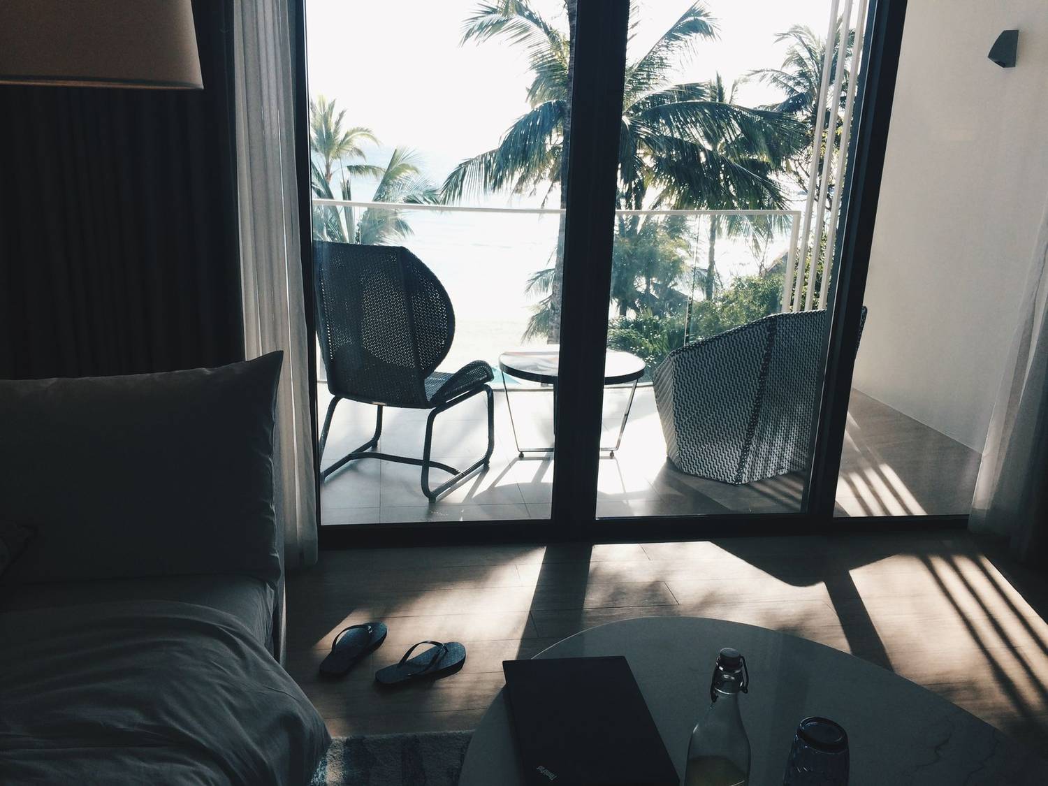 Enjoy a peaceful afternoon with a view of the beach from a resort balcony in Malay, Philippines.