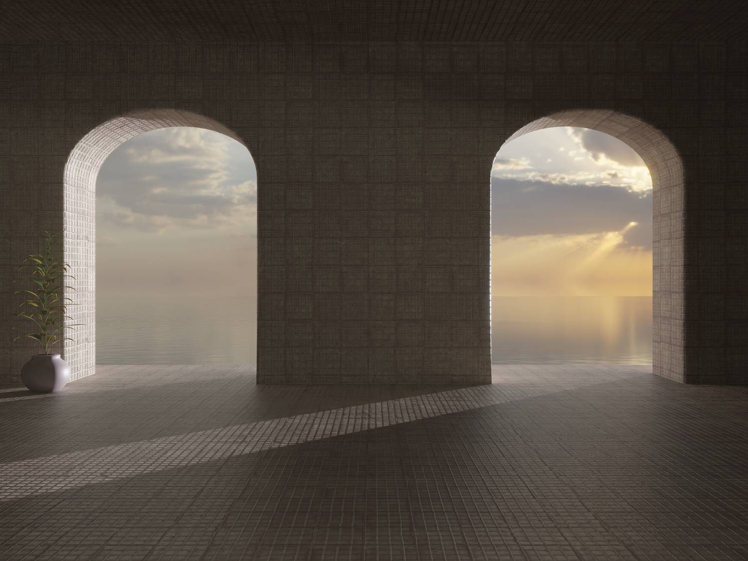 A tranquil interior with arches opening to a calm sea view at sunset, enhancing a serene atmosphere.