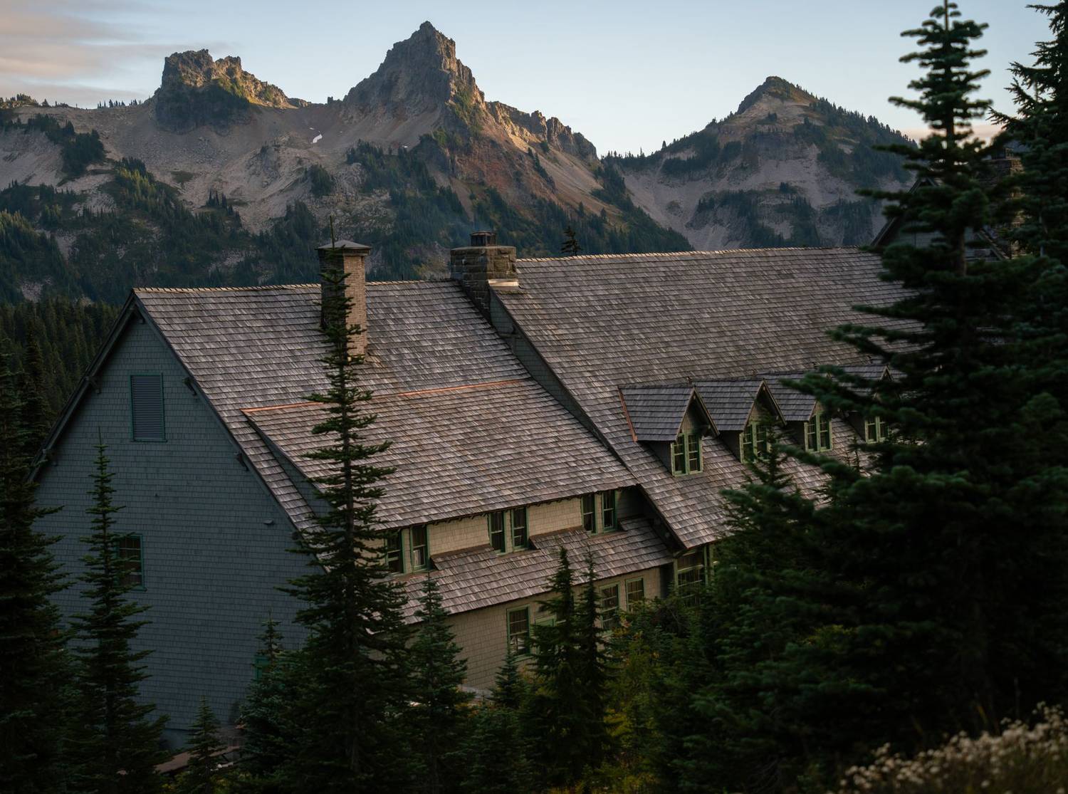 Historic lodge nestled in the forest with mountain vistas in Mount Rainier National Park.